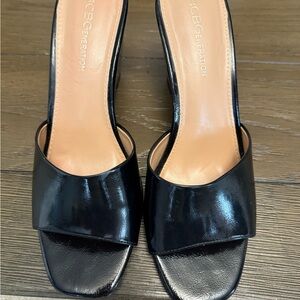 BCBGeneration Black Mules Classic Slip-On Style